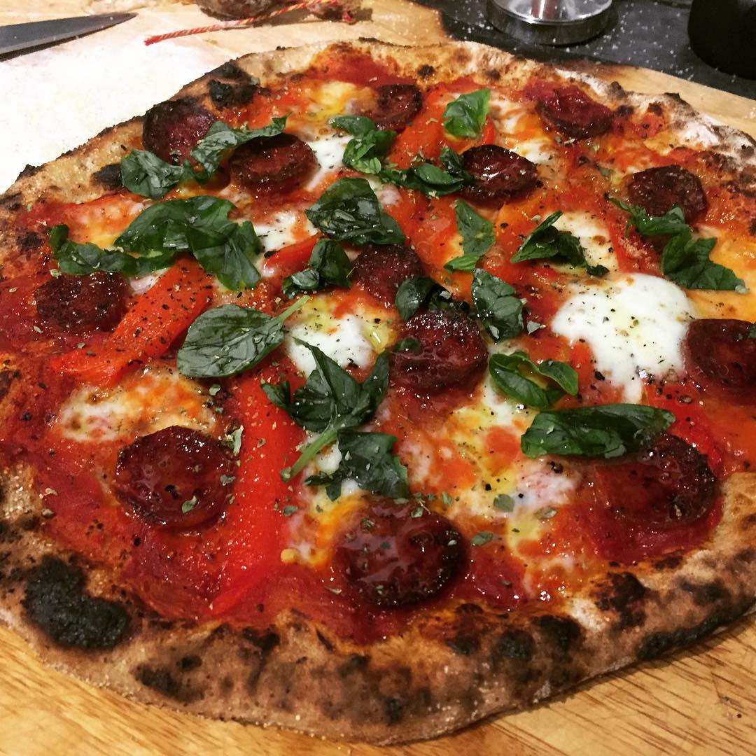 Pizza made in the outdoor  oven yesterday.