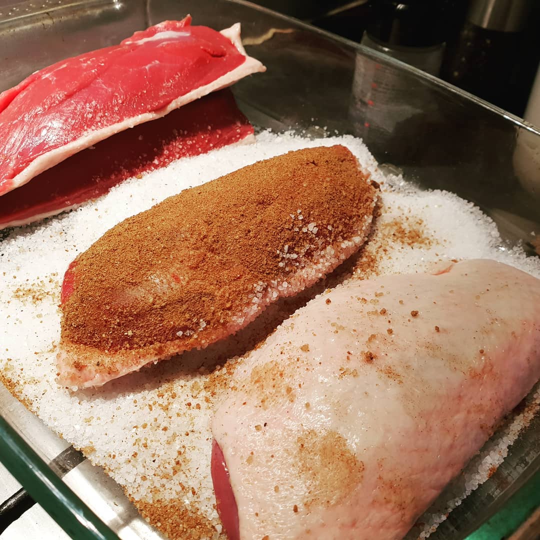 Duck breast  about to get cured.